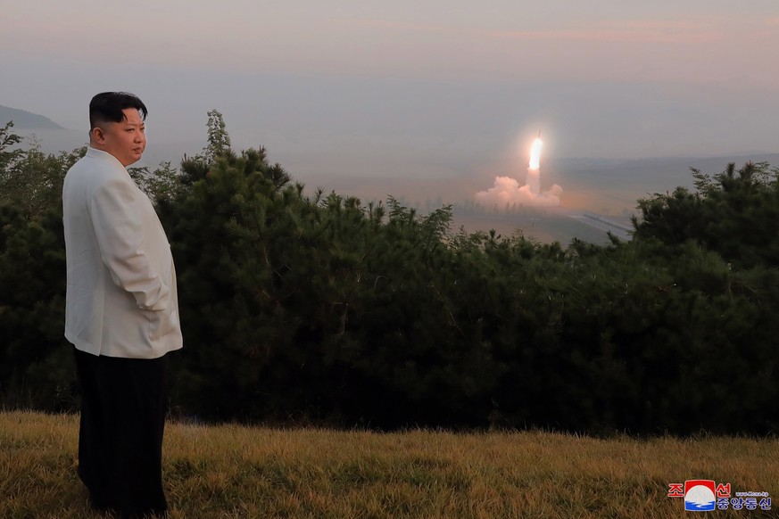 epaselect epa10233814 An undated photo released on 10 October 2022 by the official North Korean Central News Agency (KCNA) shows North Korean Supreme Leader Kim Jong-un overseeing a military drill car ...