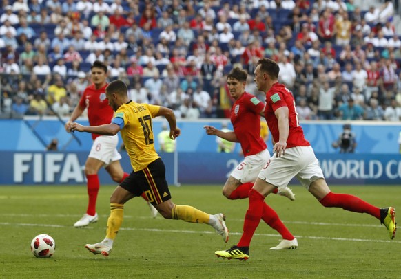 Belgium&#039;s Eden Hazard prepares to score his side&#039;s second goal during the third place match between England and Belgium at the 2018 soccer World Cup in the St. Petersburg Stadium in St. Pete ...