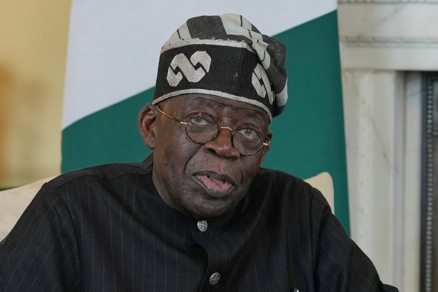 FILE -Nigerian President Bola Tinubu speaks to the media ahead of his meeting with Britain's Prime Minister Keir Starmer inside 10 Downing Street in London, Thursday, March 19, 2026. (AP Photo/Ki ...