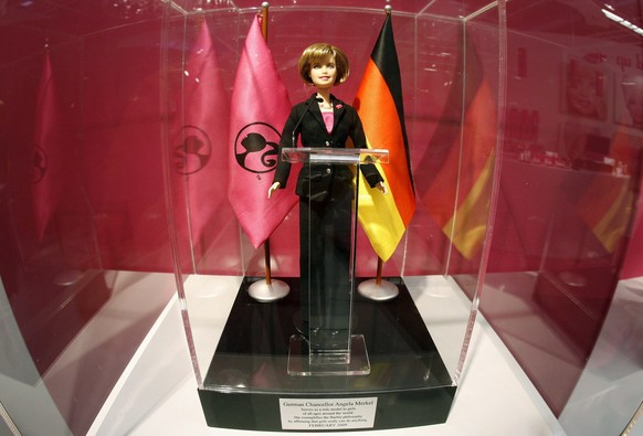 epa01630086 A Barbie doll by Mattel designed after German Chancellor Angela Merkel pictured at the International Toy Fair in Nuremberg, Germany, 09 February 2009. The doll is a unique item and was pro ...