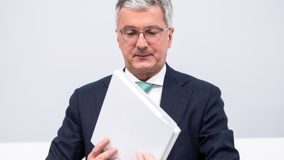 epa06817871 (FILE) - CEO of Audi AG, Rupert Stadler, holds a folder with documents prior to the beginning of the annual General Meeting of Audi AG in Ingolstadt, Bavaria, Germany, 09 May 2018 (reissue ...