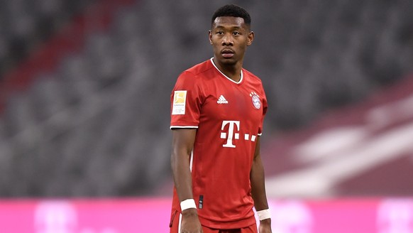 epa08917452 Bayern&#039;s David Alaba reacts during the German Bundesliga soccer match between FC Bayern Muenchen and 1. FSV Mainz 05 at Allianz Arena in Munich, Germany, 03 January 2021. EPA/LUKAS BA ...