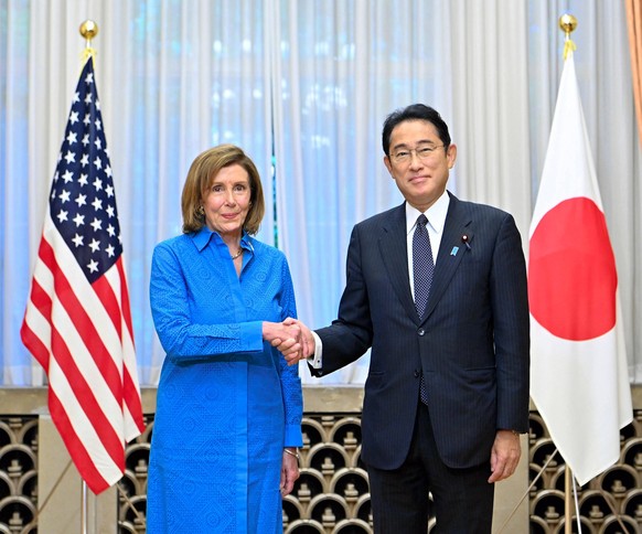 epa10106692 US House speaker Nancy Pelosi (L) is welcomed by Japanese Prime Minister Fumio Kishida (R) during their meeting at the prime minister&#039;s official residence in Tokyo, Japan, 05 August 2 ...