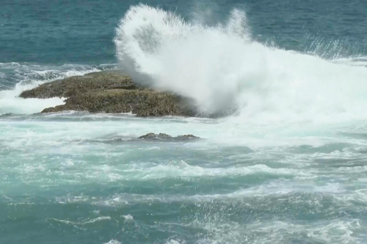 In this image made from video, waves crash on rocks ahead of Typhoon Bavi along the coast of Keelung in northern Taiwan on Thursday, July 9, 2026. (AP Photo/Taijing Wu)
Taiwan Asia Storms