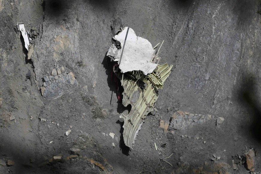 Debris of the Germanwings Airbus A320 are seen at the site of the crash, near Seyne-les-Alpes, French Alps March 29, 2015. The co-pilot suspected of deliberately crashing a passenger plane in the Fren ...