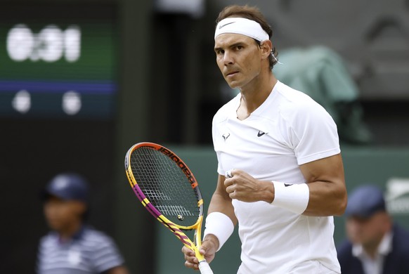 epa10052218 Rafael Nadal of Spain reacts during the 4th round match against Botic Van De Zandschulp of the Netherlands at the Wimbledon Championships, in Wimbledon, Britain, 04 July 2022.  EPA/TOLGA AKMEN   EDITORIAL USE ONLY