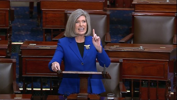 This image from Senate Television video shows Sen. Joni Ernst, R-Iowa, speaking on the Senate floor Wednesday, Nov. 1, 2023. Republican senators angrily challenged Sen. Tommy Tuberville on his blockad ...