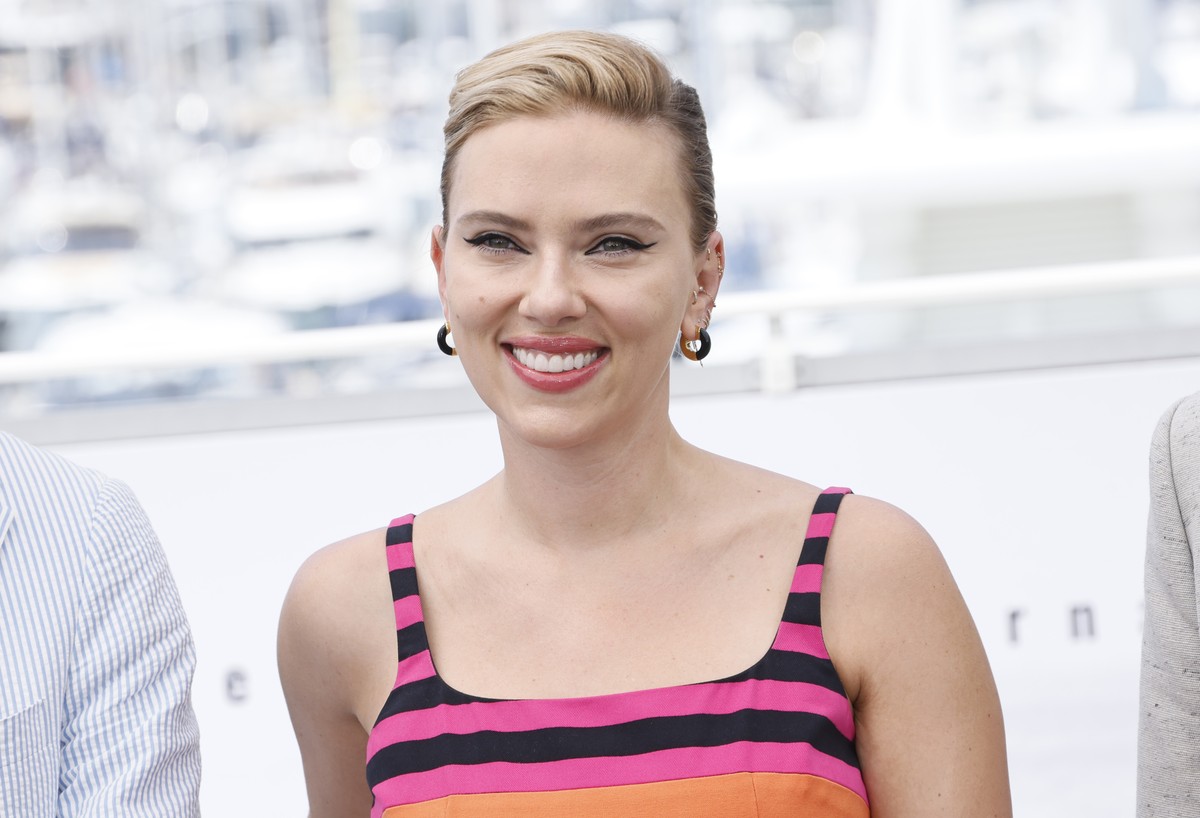 FILE - Scarlett Johansson poses for photographers at the photo call for the film "Asteroid City" at the 76th international film festival in Cannes, southern France, May 24, 2023. Johansson a ...