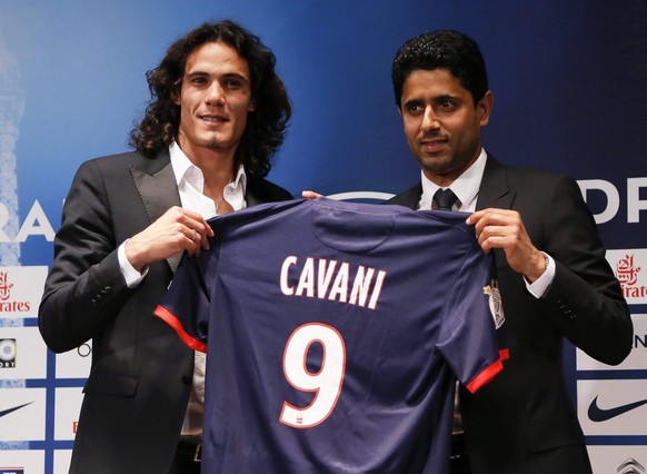 Der katarische Präsident von PSG, Nasser Al-Khelaifi mit Edinson Cavani.