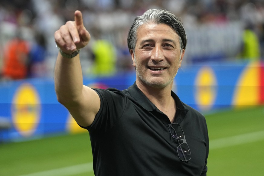 Switzerland&#039;s head coach Murat Yakin gestures before a Group A match between Switzerland and Germany at the Euro 2024 soccer tournament in Frankfurt, Germany, Sunday, June 23, 2024. (AP Photo/Dar ...