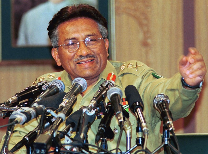 FILE - Then Pakistan Gen. Pervez Musharraf gestures at a news conference, Thursday March 23, 2000, in Islamabad. Gen. Musharraf, who seized power in a bloodless coup and later led a reluctant Pakistan ...