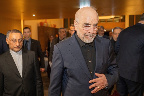 Speaker of the Islamic Parliament of Iran Mohammed Bagher Ghalibaf, center, arrives at the Buergenstock resort in Obbuergen, near Lucerne, Switzerland, early Sunday, June 21, 2026. (Urs Flueeler/Keyst ...
