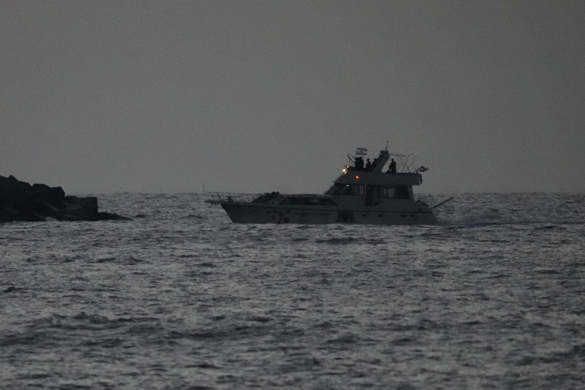 Israeli naval forces sail a confiscated Gaza-bound flotilla boat into Israel's Ashdod port after intercepting the vessel on the Mediterranean Sea, Tuesday, May 19, 2026. (AP Photo/Ariel Schalit)
 ...