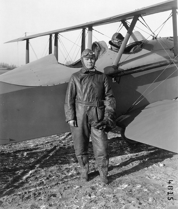 Lieutenant Edwin Eugene Aldrin Sr., in flying clothes, standing by the cockpit of an unidentified aircraft; probably McCook Field, Ohio, 18 November 1919