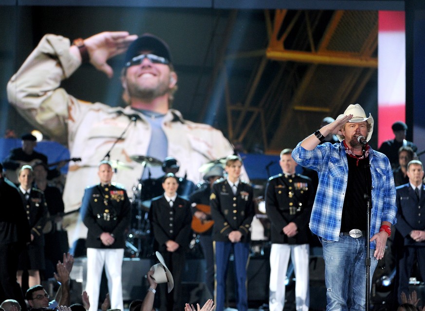 Toby Keith performs at ACM Presents an All-Star Salute to the Troops on Monday, April 7, 2014, in Las Vegas. (Photo by Chris Pizzello/Invision/AP)