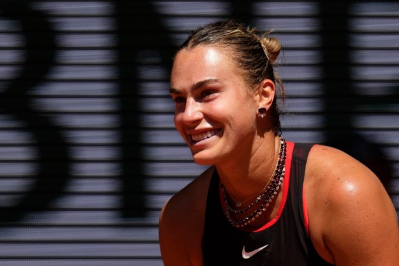 Aryna Sabalenka of Belarus reacts as she plays against Jessica Bouzas Maneiro of Spain during their first round women's singles tennis match at the French Open tennis tournament in Paris, Tuesday ...