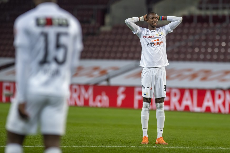 La deception du joueur du club zurichois, Assan Ceesay, droite, lors de la rencontre de football de Super League entre le Geneve Servette FC et le FC Zurich, ce mercredi 2 d�cembre 2020 au stade de Ge ...