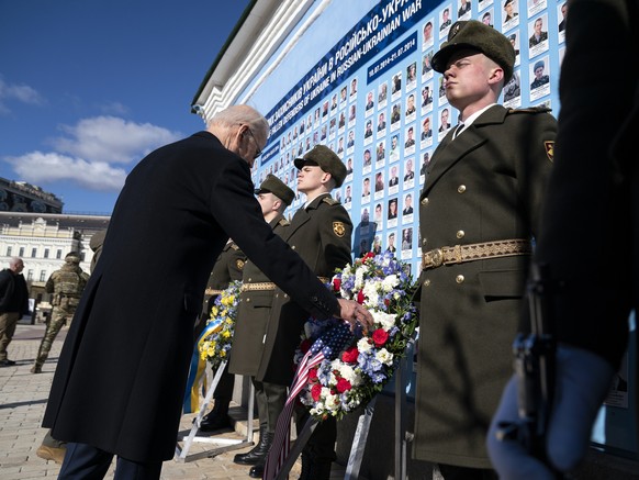 US President Joe Biden participates in a wreath laying ceremony with Ukrainian President Volodymyr Zelenskyy at the memorial wall outside of St. Michael&#039;s Golden-Domed Cathedral during an unannou ...