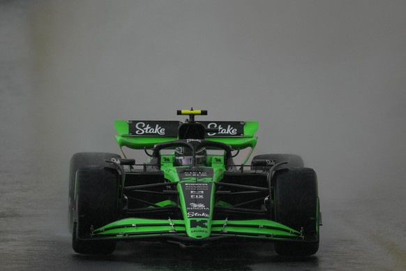 Guanyu Zhou, of China, steers his Kick Sauber during the Brazilian Formula One Grand Prix at the Interlagos race track in Sao Paulo, Sunday, Nov. 3, 2024. (AP Photo/Andre Penner)