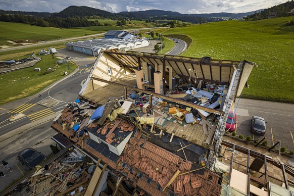 A house with its room torn off is pictured after violent storm swept through the city of La Chaux-de-Fonds, Switzerland, Switzerland, Monday, July 24, 2023. A storm swept across part of the canton of  ...