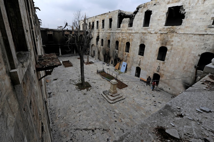 A general view shows damage in al-Sheebani school&#039;s courtyard, in the Old City of Aleppo, Syria December 17, 2016. REUTERS/Omar Sanadiki SEARCH &quot;ALEPPO HERITAGE&quot; FOR THIS STORY. SEARCH  ...