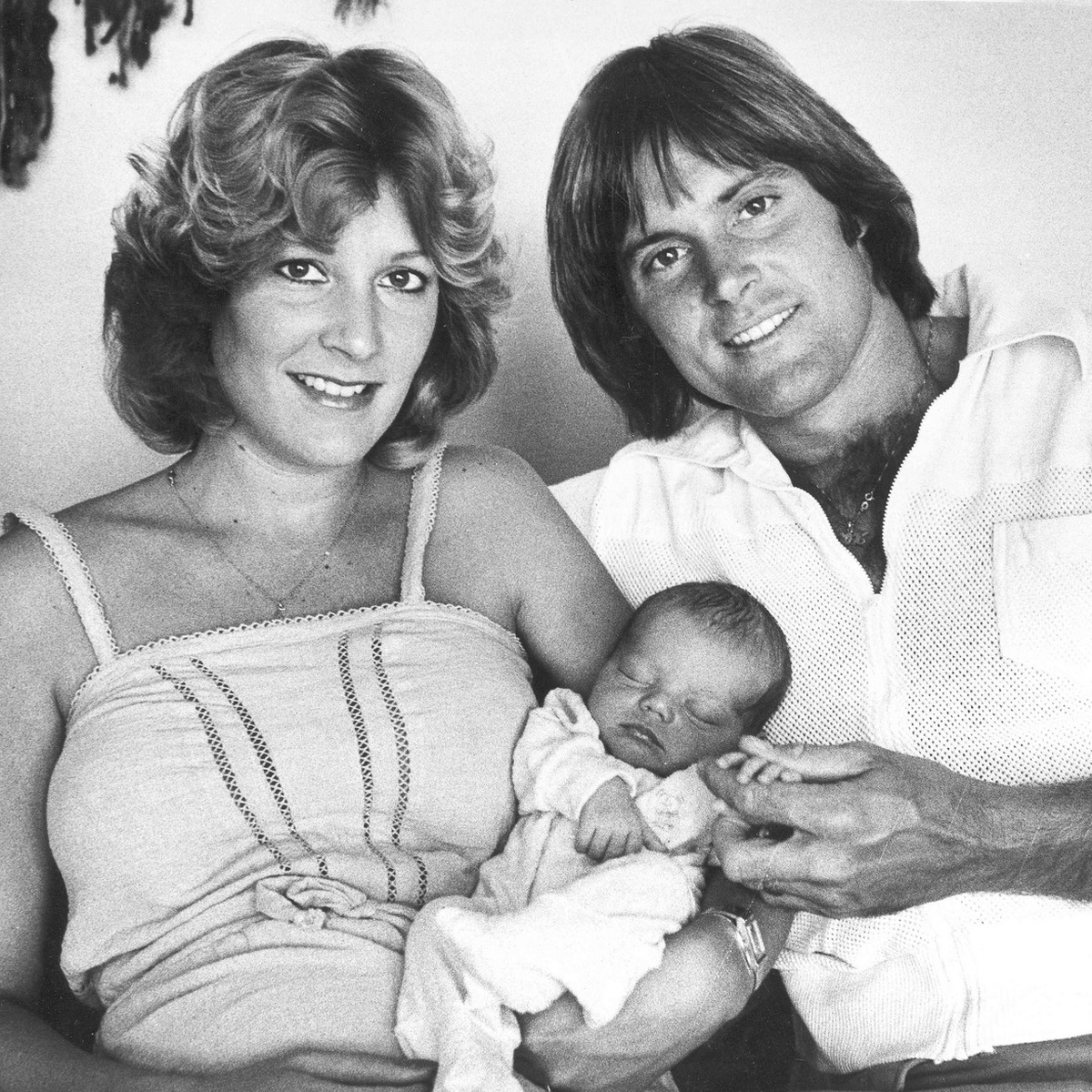 Thirteen-day-old Burton William Jenner couldn't stay awake for this family portrait following his first television appearance on the talk show "America Alive," but Olympic decathlon cha ...