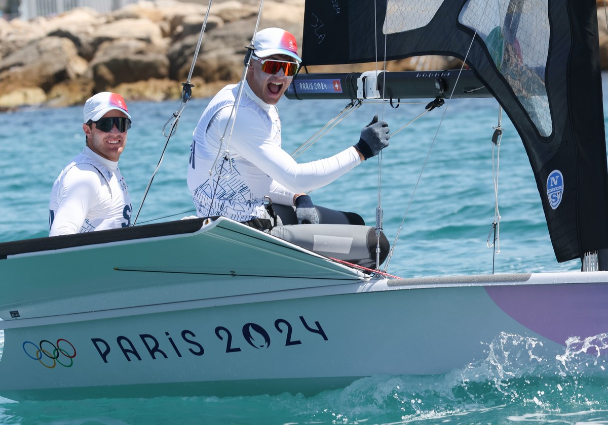 epa11506326 Swiss Sebastien Schneiter and Arno De Planta on 49er during men's Skiff Opening series race at sailing events in Paris 2024 Olympic Games in Marseille, France, 29 July 2024. EPA/OLIVI ...