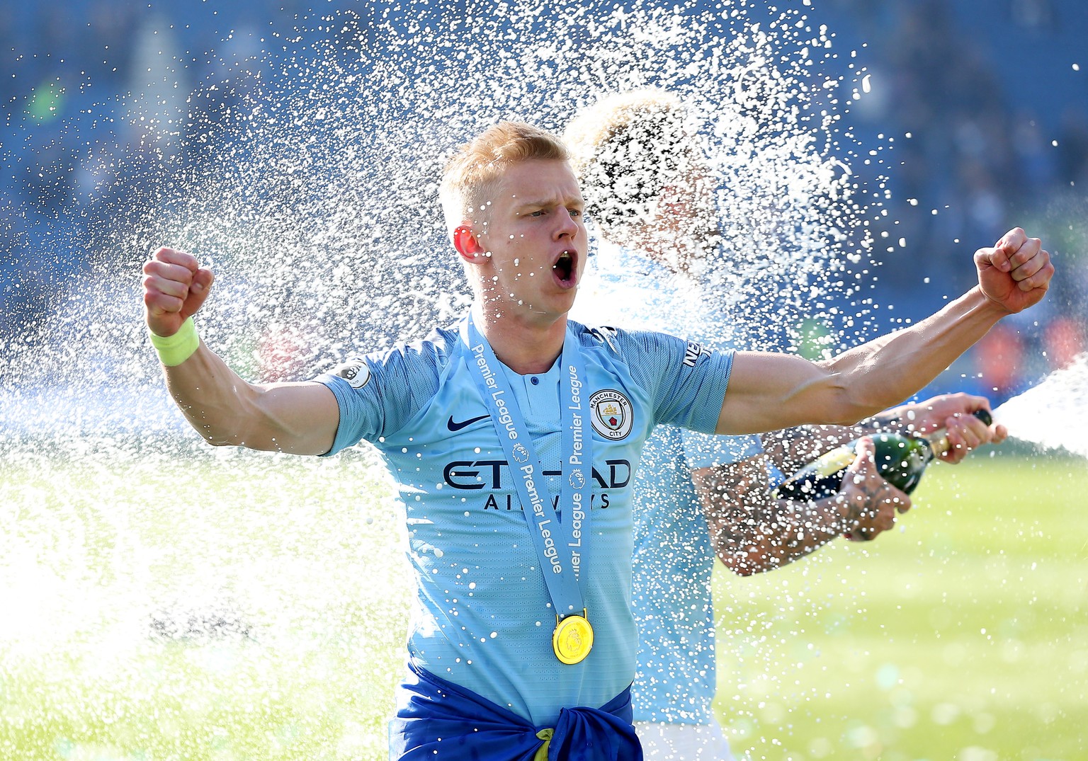 epa07565325 Manchester City player Oleksandr Zinchenko celebrates after the English Premier League match between Brighton and Hove Albion and Manchester City, Brighton, Britain, 12 May 2019. Mancheste ...