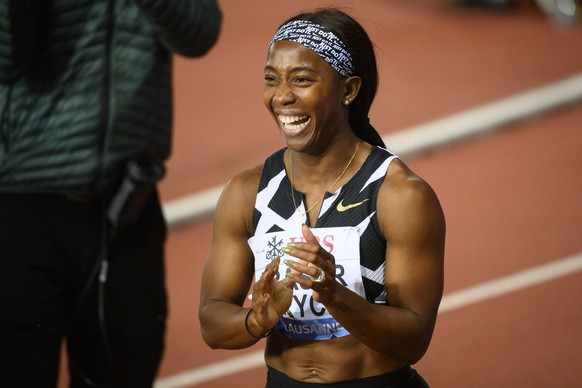 Shelly-Ann Fraser-Pryce of Jamaica reacts after competing in the women&#039;s 100 meters race at the Athletissima IAAF Diamond League international athletics meeting at the Stade Olympique de la Ponta ...