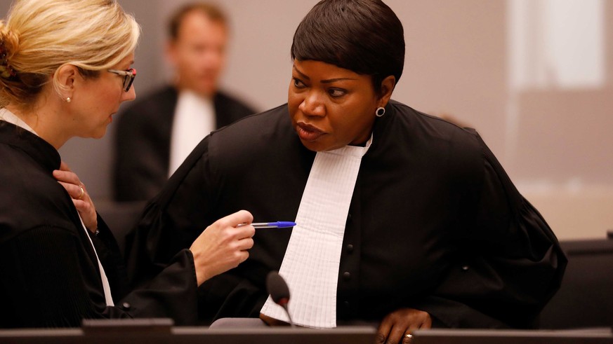 epa06978032 Prosecutor Fatou Bensouda (L) in the case against Congolese Bosco Ntagandas (not pictured) in the courtroom of the International Criminal Court (ICC) during the closing statements of his t ...