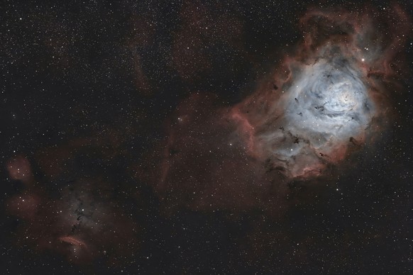 epaselect epa12314110 An image composed by the integration of four hours of photographic exposures shows Messier 8, also known as the Lagoon Nebula, taken from La Hayuela, Cantabria, Spain, 21 August  ...