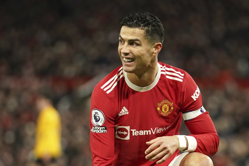 Manchester United&#039;s Cristiano Ronaldo grimaces during the English Premier League soccer match between Manchester United and Wolverhampton Wanderers at Old Trafford stadium in Manchester, England, ...