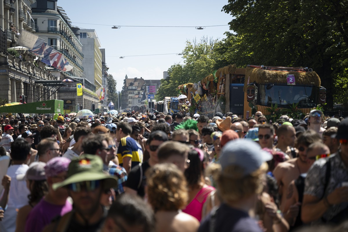 epa13156754 Participants dance through the streets during the 33rd Street Parade in the city center of Zurich, Switzerland, 08 August 2026. The annual dance music event runs this year under the theme  ...