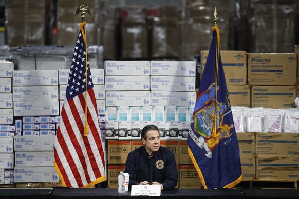 FILE - In this March 24, 2020, file photo New York Gov. Andrew Cuomo speaks during a news conference against a backdrop of medical supplies at the Jacob Javits Center that will house a temporary hospi ...