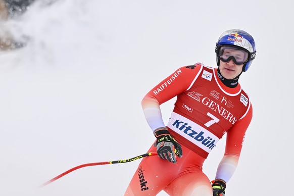 Marco Odermatt of Switzerland reacts in the finish area during the men's downhill race at the Alpine Skiing FIS Ski World Cup in Kitzbuehel, Austria, Friday, January 20, 2023. (KEYSTONE/Jean-Christoph ...