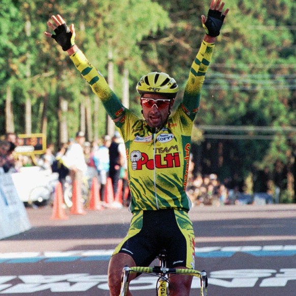 Mauro Gianetti of Switzerland celebrates after winning the Japan Cup Cycle Road Race and the final leg of the 11-series World Cup on 179.5 kilometer course in Utsunomiya, north of Tokyo, in four hours ...