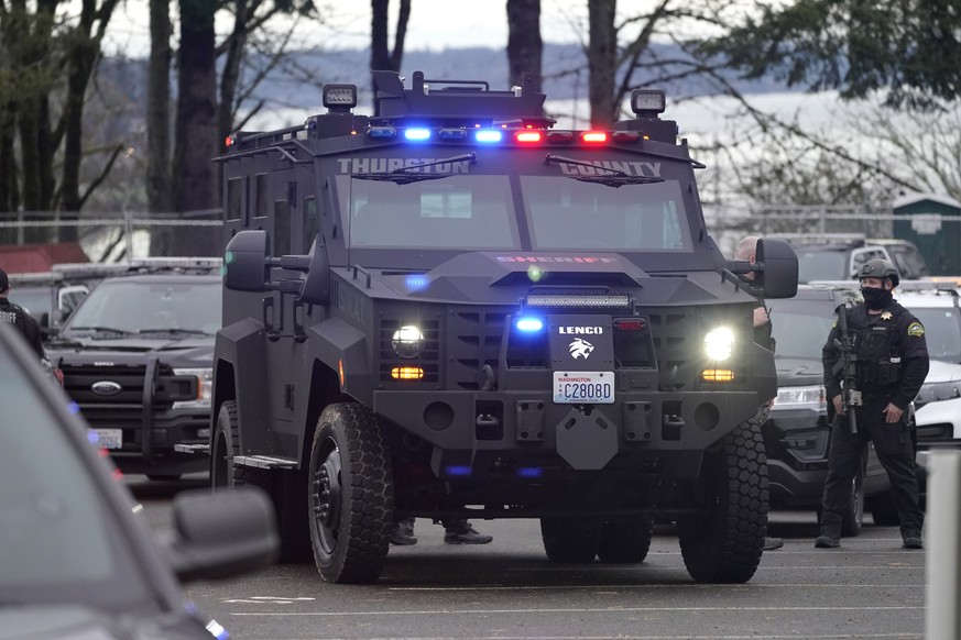 A Thurston County Sheriff&#039;s Department BearCat armored vehicle is shown in a parking lot near the Governor&#039;s Mansion after a crowd of protesters were able to get through a perimeter fence an ...