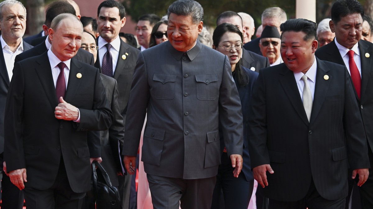 Front from left, Russian President Vladimir Putin, Chinese President Xi Jinping and North Korean leader Kim Jong Un arrive at a military parade to commemorate the 80th anniversary of Japan's Worl ...