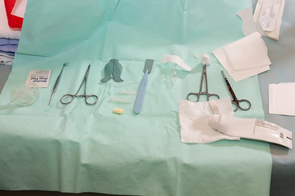 Tools and instruments for use by a mohel or ritual circumcisor p including alcohol swabs and a knife, before performing a brit milah or circumcision on an eight-day old Jewish male baby.