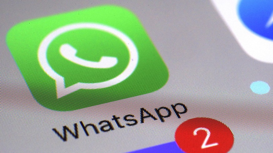 FILE - This March 10, 2017 file photo shows the WhatsApp communications app on a smartphone, in New York. Ireland&#039;s privacy watchdog said Thursday Sept. 2, 2021, it has fined WhatsApp a record 22 ...