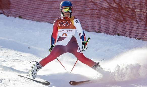 Lara Gut, of Switzerland, skis down after leaving the course during the first run of the Women&#039;s Giant Slalom at the 2018 Winter Olympics in Pyeongchang, South Korea, Thursday, Feb. 15, 2018., Th ...