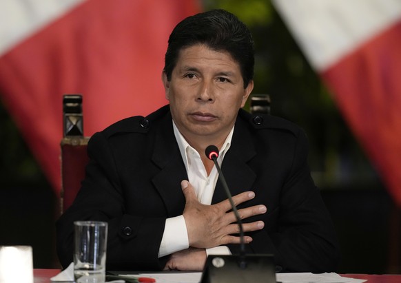 FILE - Peruvian President Pedro Castillo gives a press conference at the presidential palace in Lima, Peru, Oct. 11, 2022. On Wednesday, Dec. 7, 2022, Castillo faces a third impeachment attempt by Con ...