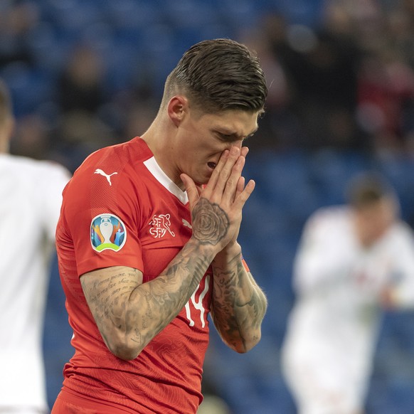 epa07465484 Switzerland&#039;s Steven Zuber reacts during the UEFA Euro 2020 qualifying Group D soccer match between Switzerland and Denmark at the St. Jakob-Park stadium in Basel, Switzerland, 26 Mar ...