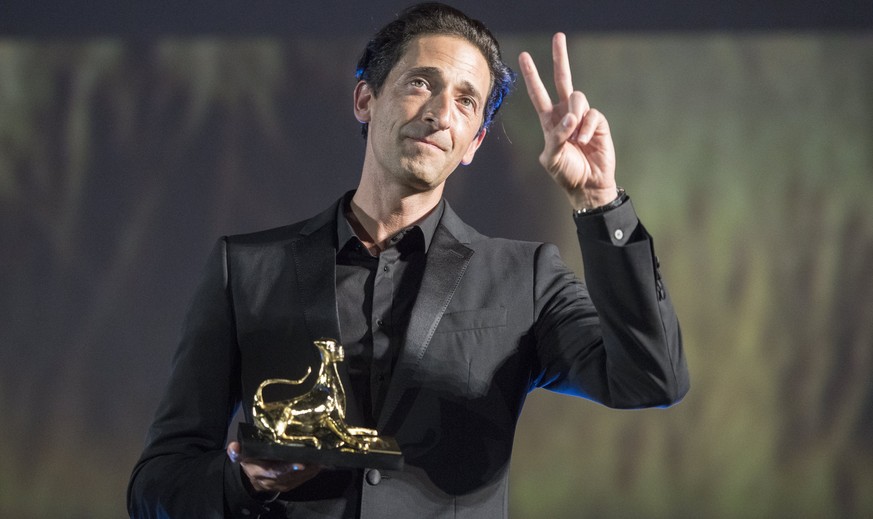 epa06125044 US actor Adrien Brody receives a Leopard Club Award at the Piazza Grande during the 70th Locarno International Film Festival, in Locarno, Switzerland, 04 August 2017. The event runs from 0 ...
