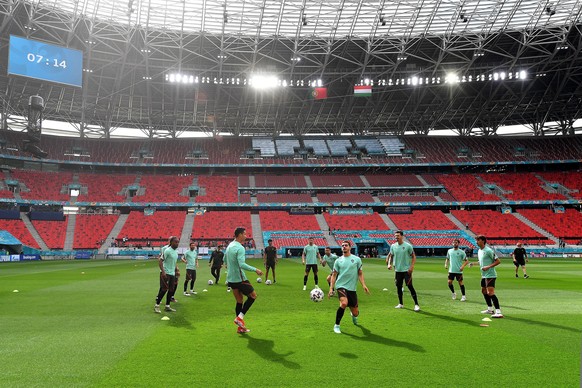 epa09271927 Players of Portugal in action during a team training session at the Ferenc Puskas stadium in Budapest, 14 June 2021, one day prior to the Euro 2020 soccer championship group F match Hungar ...