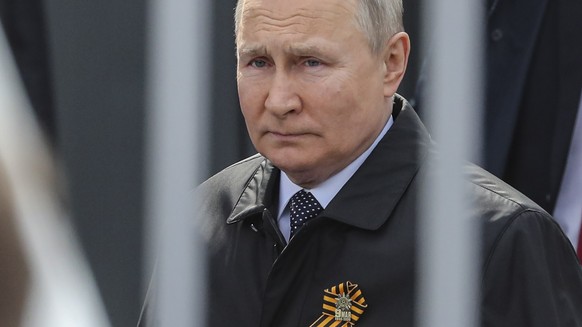 epa09935375 Russian President Vladimir Putin enters the Red Square to attend the Victory Day military parade in Moscow, Russia, 09 May 2022. Russia marks Victory Day,