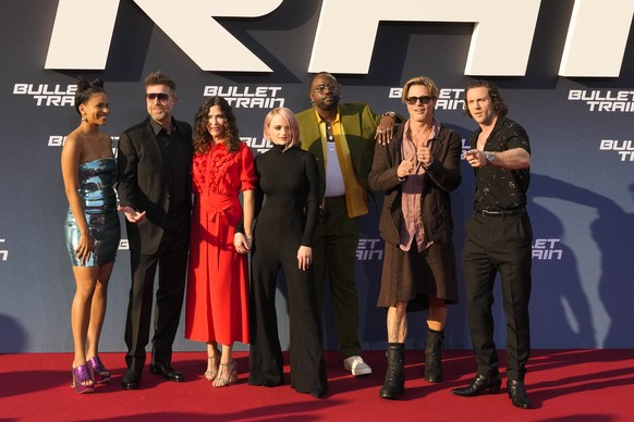 From left: Zazie Beetz, David Leitch, Kelly McCormick, Joey King, Brian Tyree Henry, Brad Pitt and Aaron Taylor-Johnson arrive for the premiere of the film &#039;Bullet Train&#039; in Berlin, Germany, ...
