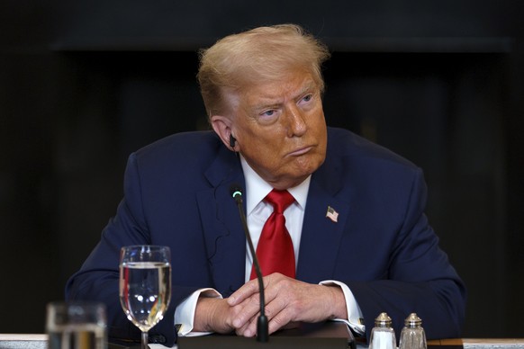epa12227695 US President Donald Trump during a meeting with African leaders at the White House, Washington, DC, USA, 09 July 2025. President Trump is meeting with the leaders of Gabon, Guinea-Bissau,  ...