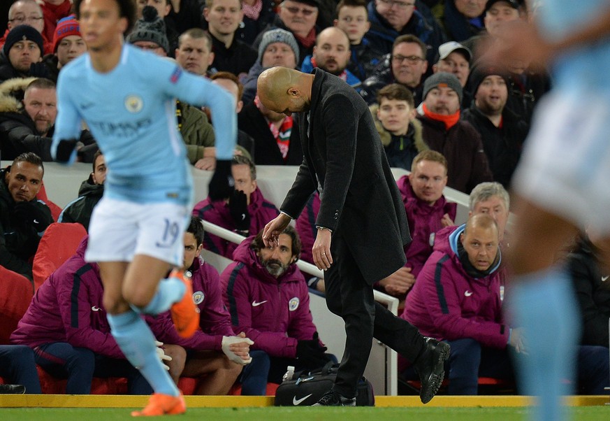 epa06646130 Pep Guardiola manager of Manchester City reacts during the UEFA Champions League quarter final first leg match between Liverpool FC and Manchester City FC at Anfield Road, Liverpool, Brita ...