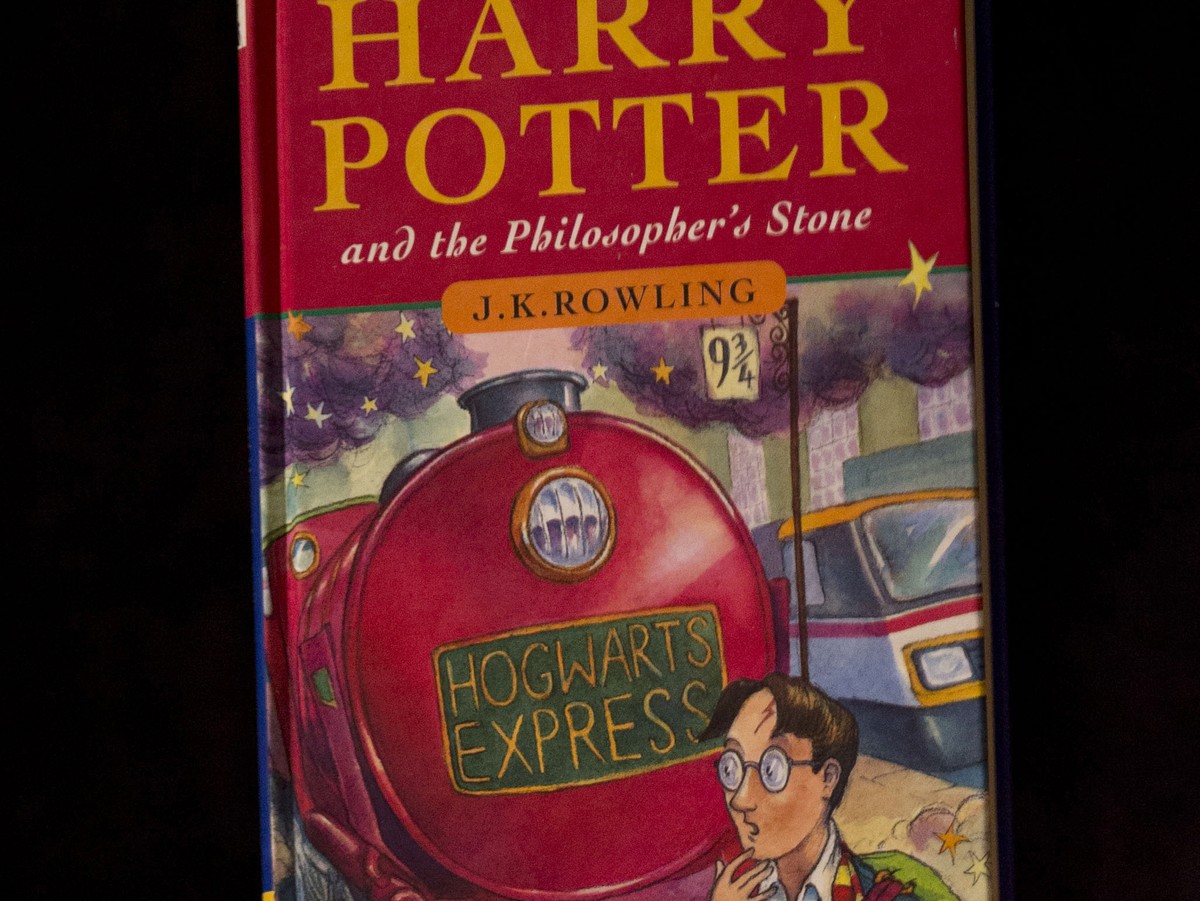 FILE - This May 20, 2013, file photo shows a first edition copy of the first Harry Potter book "Harry Potter and the Philosopher's Stone" during a photocall organized for the media at t ...